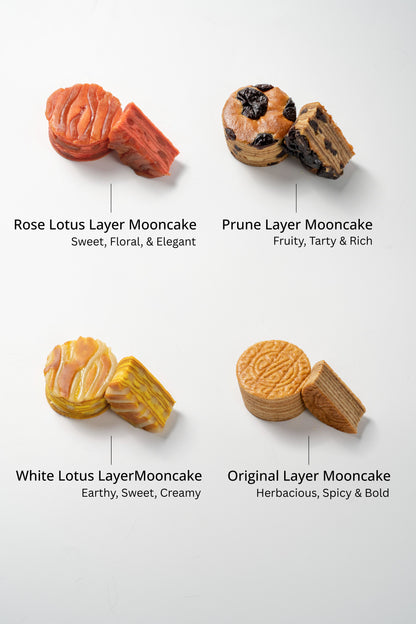 Four types of mooncake derived from layer cake shot on a white background